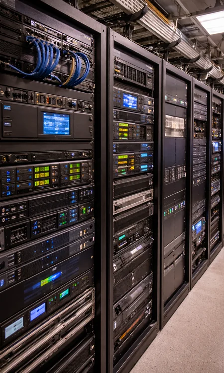 AV equipment racks with organized cabling in church installation